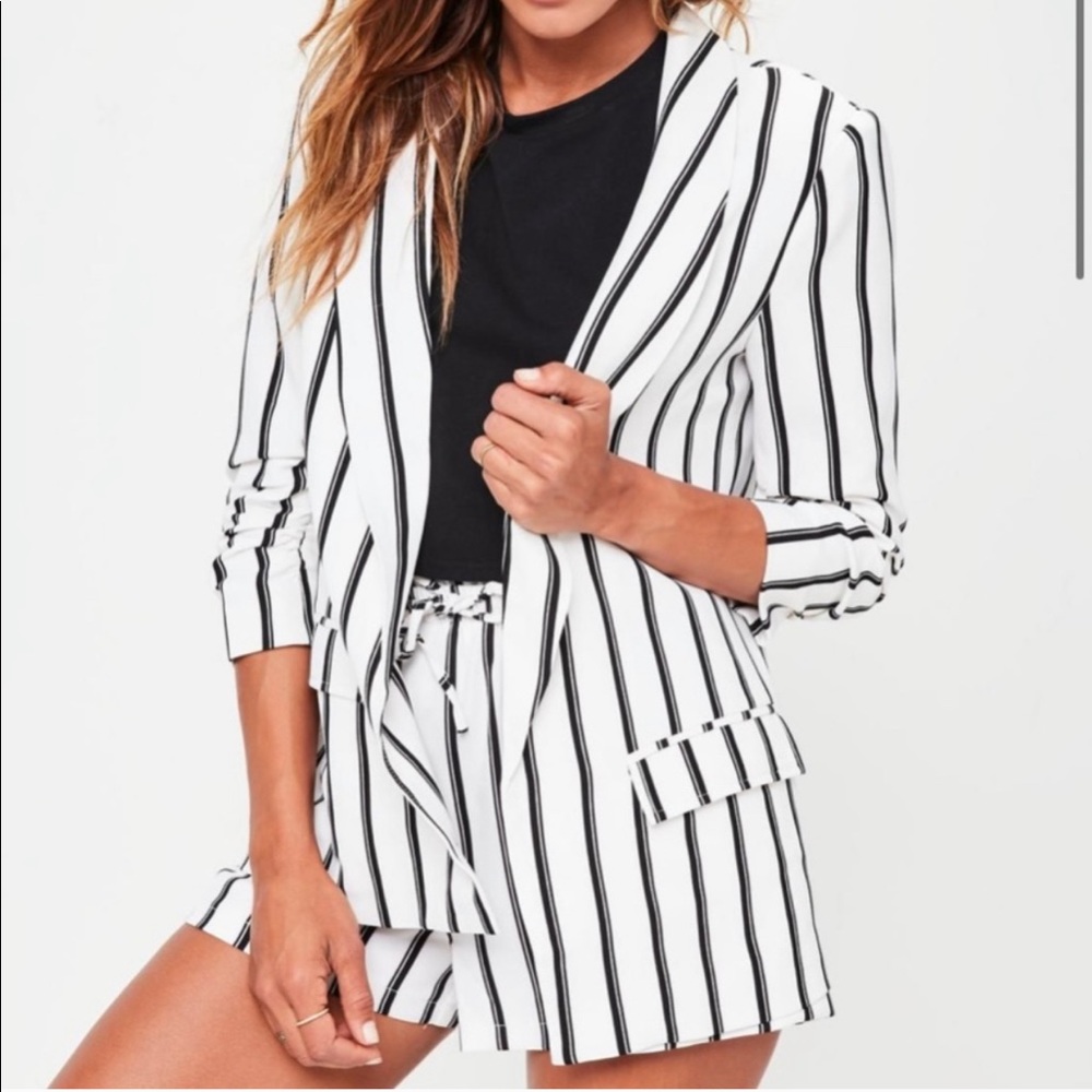 Black and white striped blazer! Worn once for beetle juice costume.